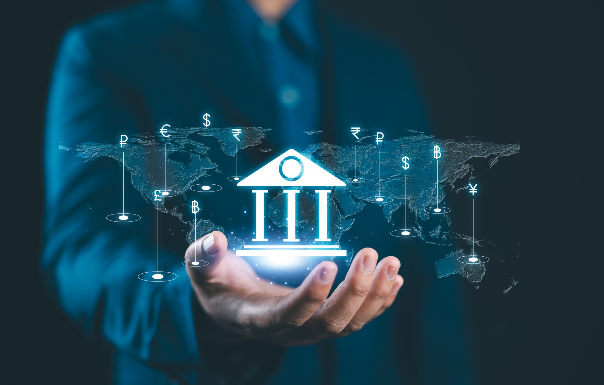 Global currency exchange concept. Businessman holding virtual banking with dollar yuan yen euro ruble, pound sterling. Central bank online, business money transfer, interbank payment, world economy.