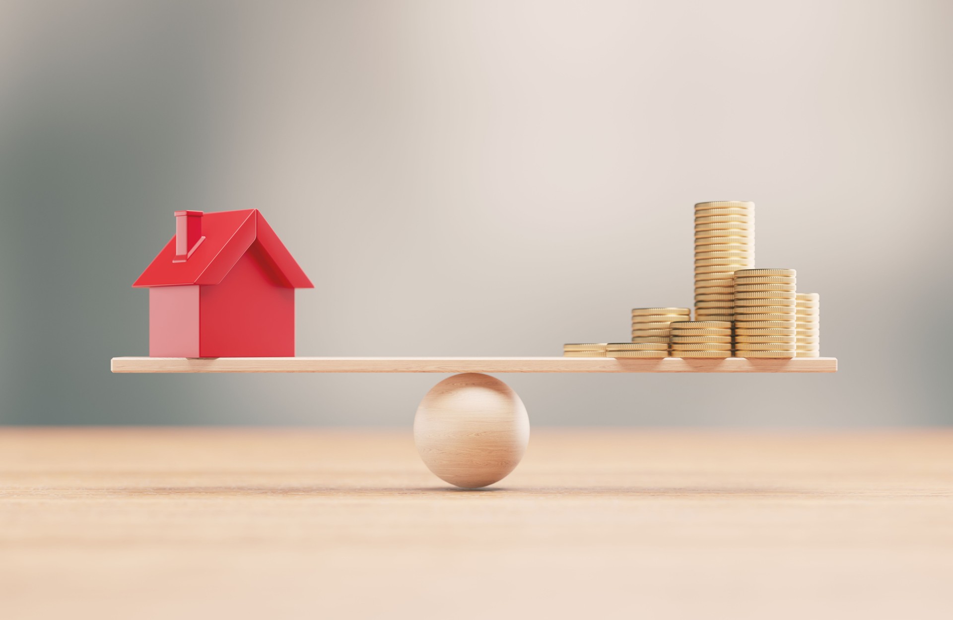 Red House Symbol And Gold Coins On A Wood Balance Scale